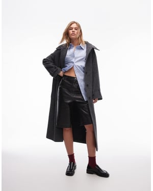 Topshop faux leather awkward length short in washed brown