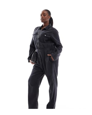 ASOS DESIGN Curve denim boilersuit with zip and elasticated waistband in wash black