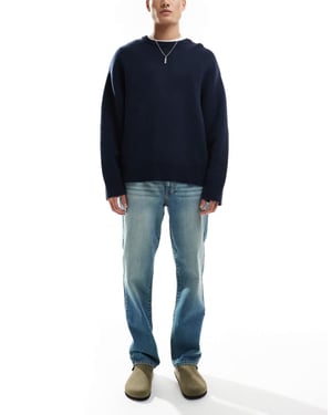 ASOS DESIGN straight leg jeans in tinted vintage light wash blue