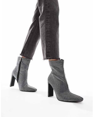 Glamorous heeled ankle boots in silver embellished