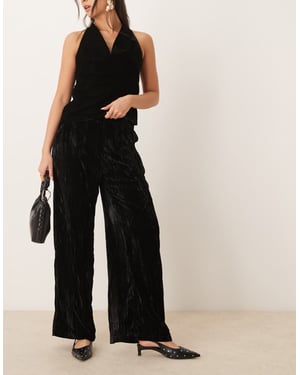 ASOS DESIGN crinkle velvet pull on trouser in black