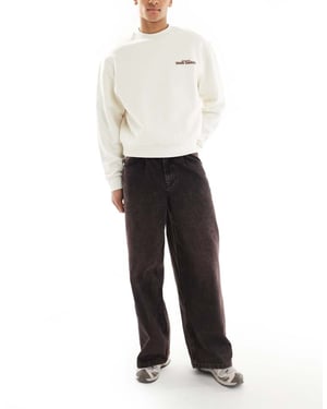 ASOS DESIGN lösa jeans med brun nyans i tvättad svart