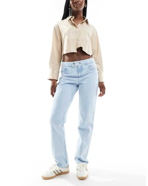 ASOS DESIGN low rise jean in stud fastening in bleach
