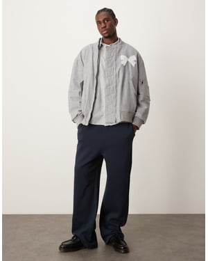 Sister Janeunisex bow embroidered bomber jacket in grey