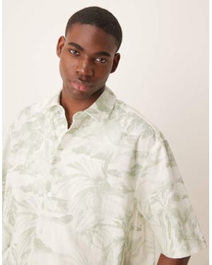 ASOS DESIGN boxy oversized shirt with floral print in green