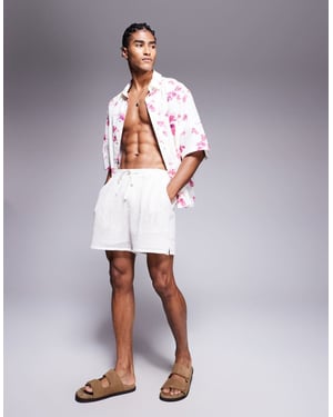ASOS DESIGN oversized shirt with floral print in white