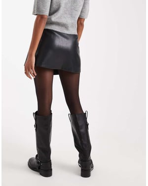 ASOS DESIGN faux leather asymmetric wrap mini skirt in black