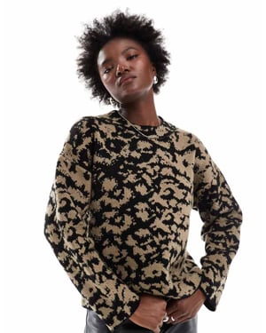 ASOS DESIGN crew neck knitted jumper in abstract leopard print