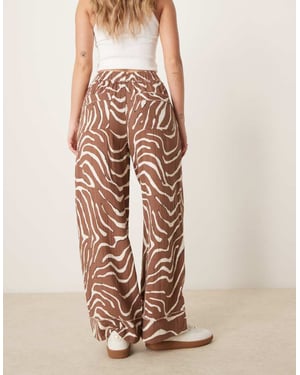 ASOS DESIGN cheesecloth pull on trousers with raw edge detail co-ord in zebra print