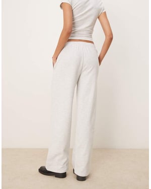 ASOS DESIGN straight leg jogger with Marseille embroidered graphic in ice marl