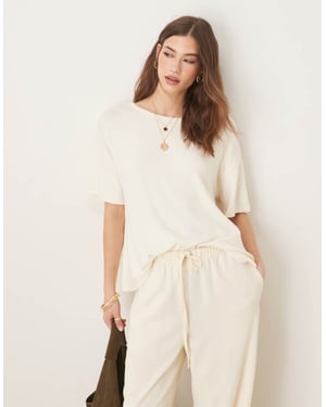 ASOS DESIGN textured knit hanky hem tee in cream