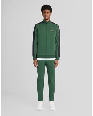Padeljoggers med sidoremsdetaljer