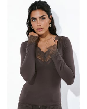 Stretchgebreide top met V-hals en kantdetail