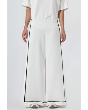 Wijde broek met contrasterende bies en modalgevoel