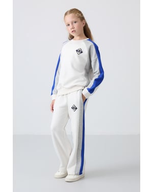 Trainingspak met colour blocking en wijde pijpen