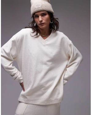 Topshop borstad v-ringad sweatshirt i krämfärg