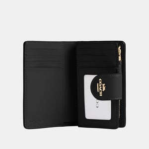 Medium Corner Zip Wallet in Signature Canvas