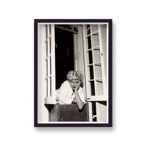 Marilyn Monroe Leaning From Window Hand on Cheek