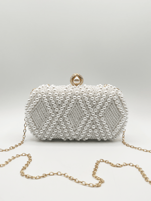 White beaded clutch bag