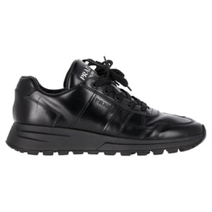 Prada Prax 01 Lace-Up Low-Top Sneakers in Black Calfskin Leather