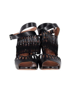 AlaÏa Cut Out Ankle-Strap Sandals in Black Leather
