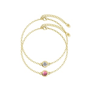 Geboortesteenarmbanden - Goud, kristal en roze
