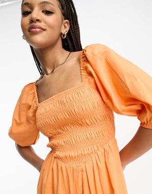 ASOS DESIGN linen look shirred puff sleeve jumpsuit in orange