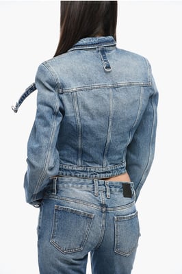 Blå jeansjacka med croppad passform och seledetaljer