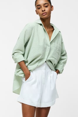 White Cotton Blend Ruffled Loose Pleated Shorts
