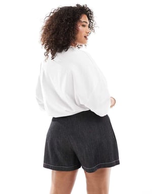 COLLUSION Plus wrap mini skort in lightweight denim with contrast stitch