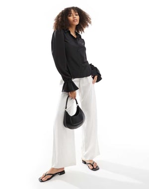 ASOS DESIGN volume sleeved soft shirt with ruffle cuffs in black