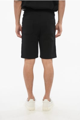 Svarta jerseyshorts med sidologotyp och band