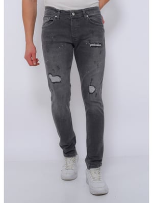 True Rise Slim fit jeans met scheuren dc