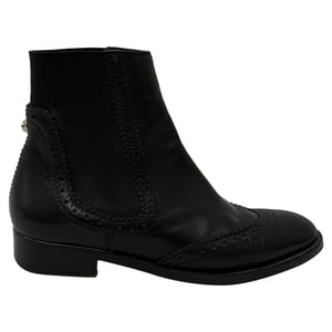 Balenciaga Perforated Wingtip Chelsea Boots in Black Leather