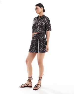 ASOS DESIGN satin wrap co-ord mini skirt in bow print