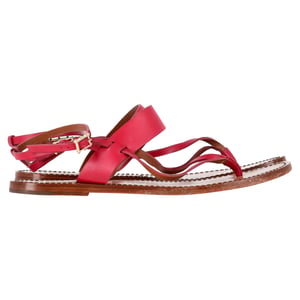 Valentino Garavani Flat Sandalen met T-knop en Enkelband in Roze Leer