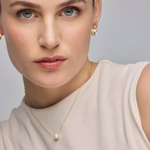 Luxenter 18k goudkleurige oorbellen met witte parel - Miclaw