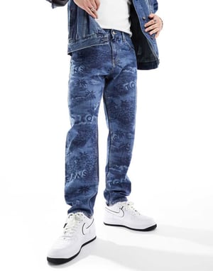 Tommy Jeans – Isaac – Avslappnade jeans i mellantvättad modell