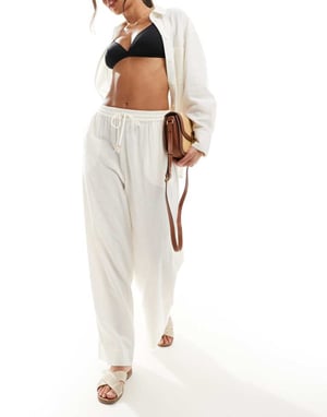 ASOS DESIGN Kayla – Vita mixa och matcha strandbyxor med vida ben
