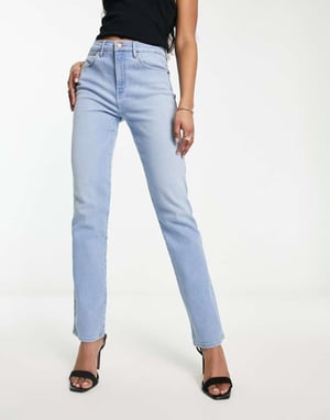 Wrangler – Ljusblå tvättade jeans med smal passform