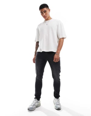 ASOS DESIGN – Svarta skinny jeans med tvätt
