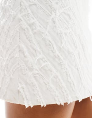 & Other Stories – Vit minikjol med texturerad jacquard