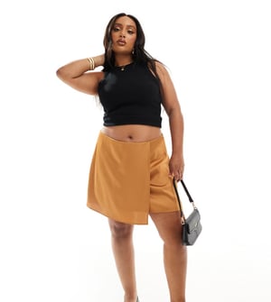 ASOS DESIGN Curve satin wrap mini skirt in golden dusk