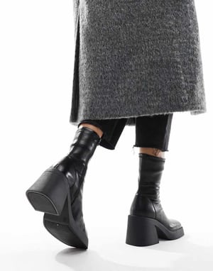 ASOS DESIGN – Radiate – Svarta stövlar med mellanhög klack