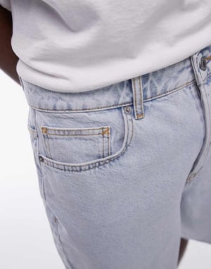 Topman – Blekt tvättade jeansshorts med vida ben och rå fåll