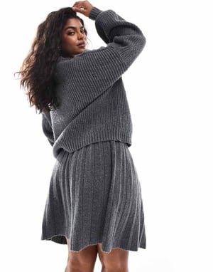 In The Style Plus knitted pleated mini skirt co-ord in charcoal