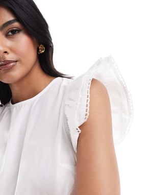 ASOS DESIGN cut out waist ruffle sleeve playsuit in white
