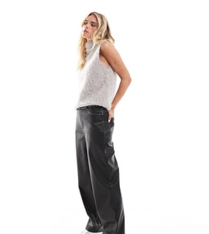 ASOS DESIGN Petite faux leather straight leg trousers in washed black