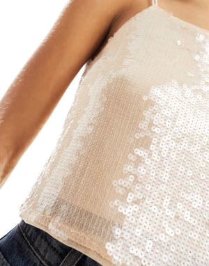 Calvin Klein Jeans – Krämfärgad paljettmönstrad linnetopp