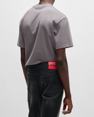Tapered-Fit Stretch Jeans in Black